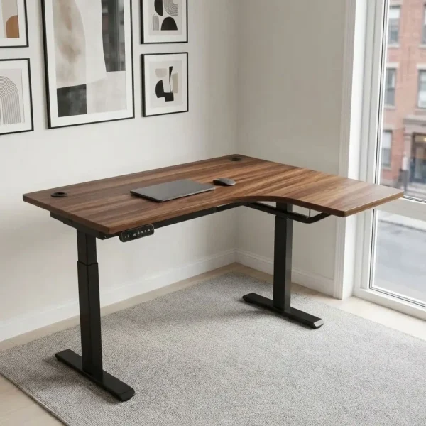 Curved electric adjustable table featuring an L-shaped curved walnut wood-grain laminate desktop with dual cable management grommets, an under-desk digital LED control handset with height presets, motor-driven sit-stand elevation mechanisms, and a heavy-duty black powder-coated steel dual-leg lifting frame with wide T-style foot bases.