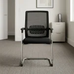 Mid-back cantilever waiting chair featuring a breathable black mesh mid-back rest with an integrated geometric pattern lumbar support band, a cushioned black fabric seat, fixed T-shaped armrests with black arm pads, and a continuous tubular chrome cantilever frame base with protective floor glides.