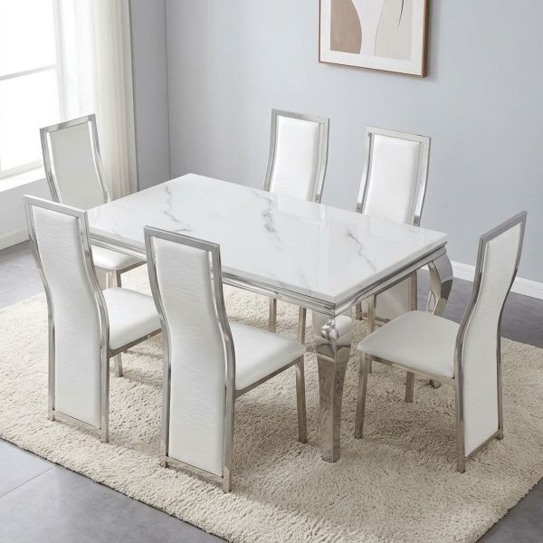 White marble dining set featuring a rectangular white faux-marble tabletop with a polished silver stainless steel frame and apron trim, six matching high-back dining chairs with white faux leather upholstery, and polished silver stainless steel curved cabriole legs.