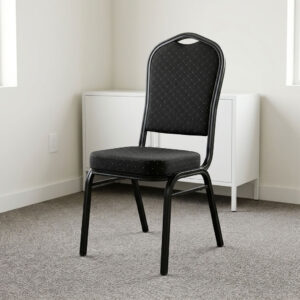 Stackable black fabric event chair featuring diamond-quilted black fabric upholstery with subtle flecked pattern details, a high-density padded crown-back backrest with integrated top handhold cut-out and thick cushioned seat, armless space-saving configuration, stackable design with side frame bumpers, and a heavy-duty black powder-coated tubular steel four-legged frame equipped with protective floor glides. Stackable black fabric event chair featuring diamond-quilted black fabric upholstery with subtle flecked pattern details, a high-density padded crown-back backrest with integrated top handhold cut-out and thick cushioned seat, armless space-saving configuration, stackable design with side frame bumpers, and a heavy-duty black powder-coated tubular steel four-legged frame equipped with protective floor glides.