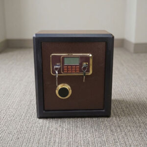 40kgs fireproof safebox featuring a heavy-duty dark brown and black powder-coated alloy steel body, a gold-trimmed electronic digital keypad with an LCD display screen, dual-key override locking mechanisms with a rotary turn knob, motorized live-locking bolts for high-security storage, and a solid flat base with floor-protective glides.