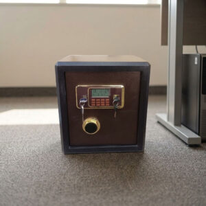 40kgs fireproof safebox featuring a heavy-duty dark brown and black powder-coated alloy steel body, a gold-trimmed electronic digital keypad with an LCD display screen, dual-key override locking mechanisms with a rotary turn knob, motorized live-locking bolts for high-security storage, and a solid flat base with floor-protective glides.