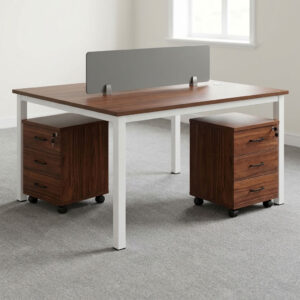 2-way open workstation featuring twin back-to-back dark walnut wood grain laminate desktops separated by a central translucent frosted glass privacy divider screen, two mobile lockable three-drawer storage pedestals with black curved handles, integrated desktop cable grommets, and a sturdy white powder-coated steel loop-leg frame equipped with floor-protective glides.