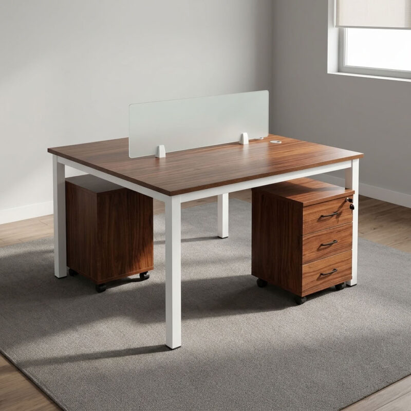 2-way open workstation featuring twin back-to-back dark walnut wood grain laminate desktops separated by a central translucent frosted glass privacy divider screen, two mobile lockable three-drawer storage pedestals with black curved handles, integrated desktop cable grommets, and a sturdy white powder-coated steel loop-leg frame equipped with floor-protective glides.